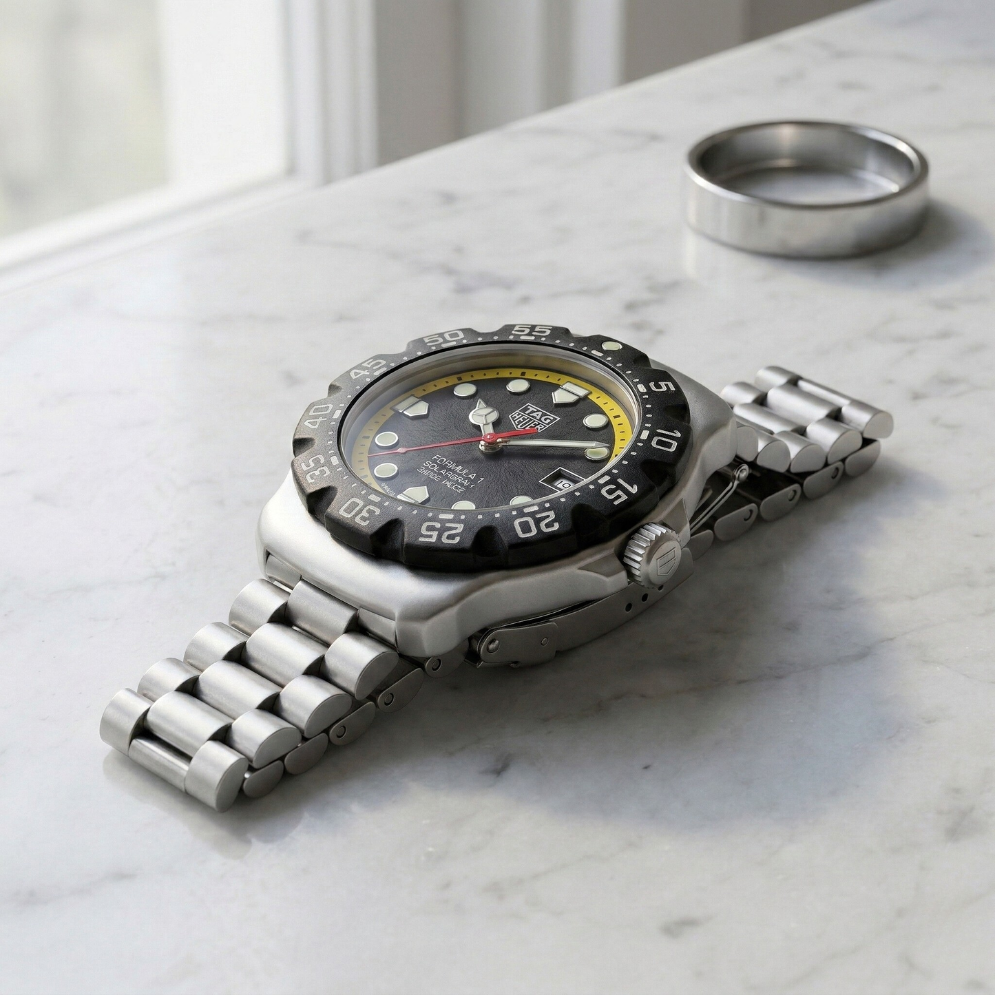 TAG Heuer Formula 1 Solargraph Black Dial Yellow Ring Stainless Steel Bracelet
